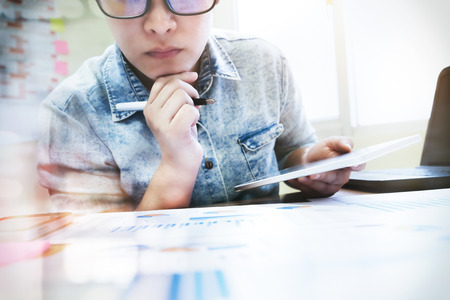 Working business people analyse high performance marketing data.の写真素材