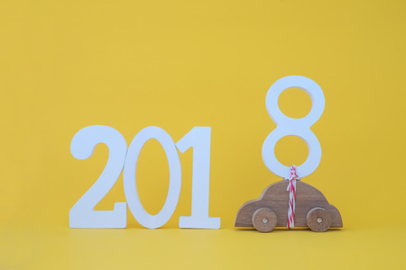 2018 Happy New Year  idea concept on yellow background.の写真素材