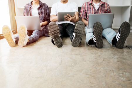 Young startups businessmen teamwork brainstorming meeting to discuss plan startup projectの写真素材