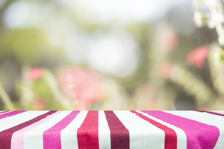 Selective focus empty wooden table on blured sweet pastel vintage bokeh background.の写真素材