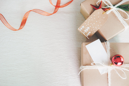 Preparation the Christmas vintage gift box on table. Chrsitmas , Happy New Year and Birthday giftset.の写真素材