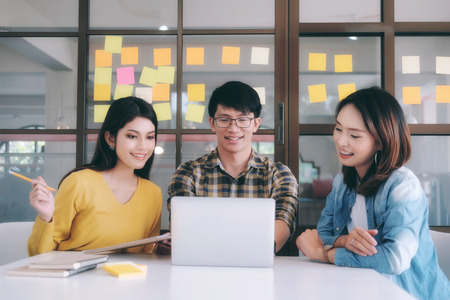 Young startups business people teamwork brainstorming meeting. Business teamwork and education concept.の写真素材