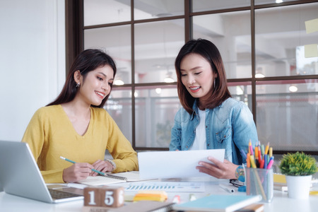 Young startups business people teamwork brainstorming meeting. Business teamwork and education concept.の写真素材