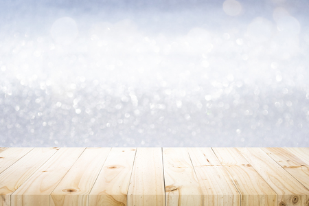 Wood table top on bokeh abstract background and used for montage or display products.の写真素材