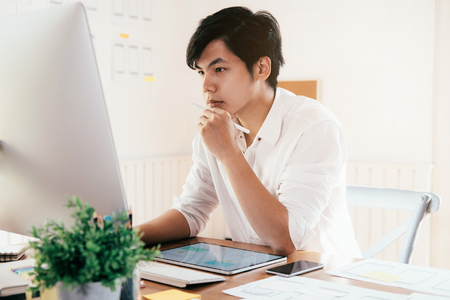 Web designer, UX UI designer design user interface of mobile phone application. Creative planning application development sketch layout wireframe design. User interface and User experience technology concept.の写真素材