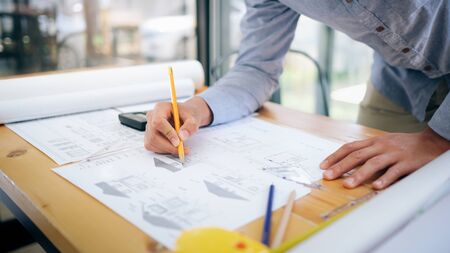 Architect or engineer working in office, Construction concept. Engineering tools.の写真素材