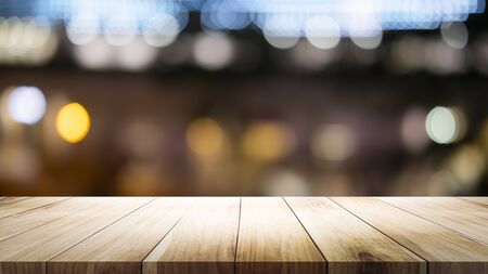 Empty wooden table platform and bokeh at night