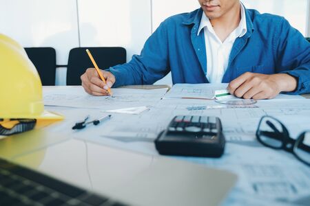 Architect or engineer working in office, Construction concept. Engineering tools.