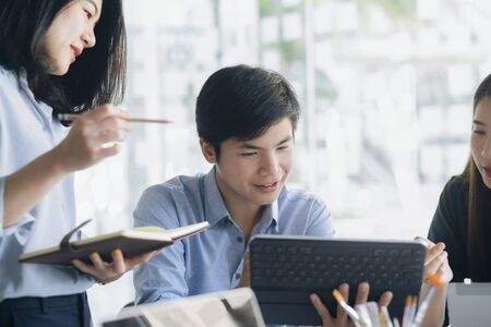 Young startup businessmen teamwork brainstorming meeting to discuss the new project investment.
の写真素材
