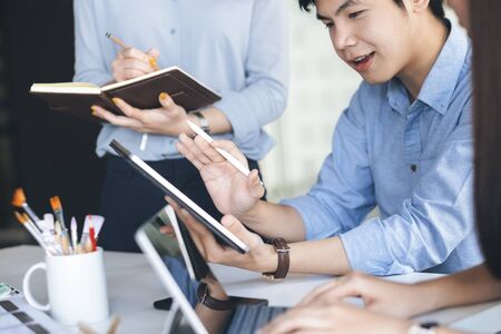 Young startup businessmen teamwork brainstorming meeting to discuss the new project investment.
の写真素材