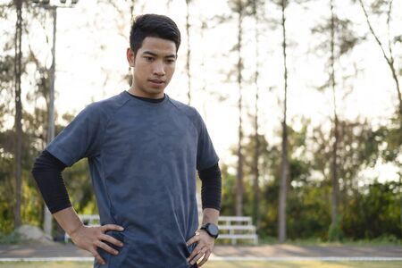 Portrait young man get ready to workout.の写真素材