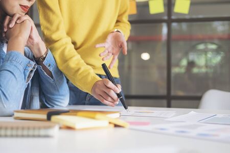 Young startup businesspeople brainstorming meeting to discuss the new project investment.の写真素材