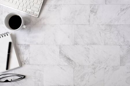 Topview flat lay of working table with office stationary. Modern and comfortable working desk concept.の写真素材