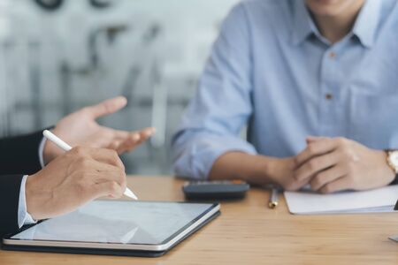Young startup businessmen teamwork brainstorming meeting to discuss the new project investment.
の写真素材