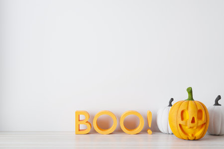 Happy halloween holiday concept. Halloween background with Jack O'Lantern and pumpkinsの写真素材