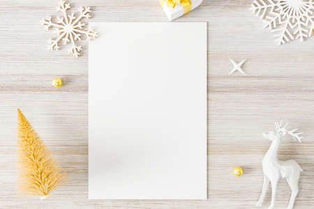 Mockup of postcard or poster photo frame with christmas decoration.の写真素材