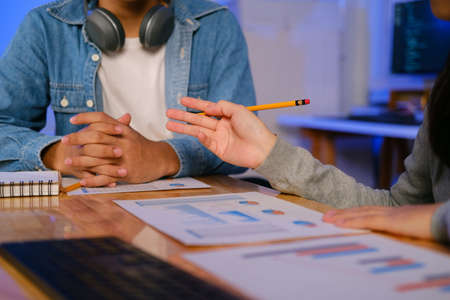 Young startup businessmen teamwork brainstorming meeting to discuss the new project investment.