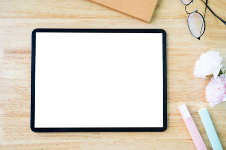 Digital tablet mockup on office working tableの写真素材