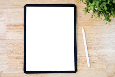 Digital tablet mockup on office working tableの写真素材
