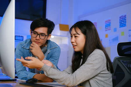 Programmer and developer teamwork working in a software development and coding technologies at...
