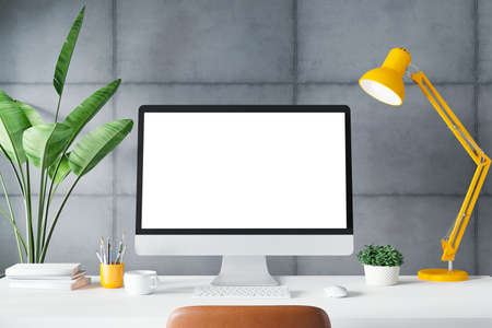 Workspace with mockup blank screen laptop computer. 3D Rendering.の写真素材