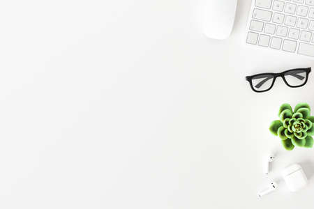 Topview of desktop white desk,working space,working background.の写真素材