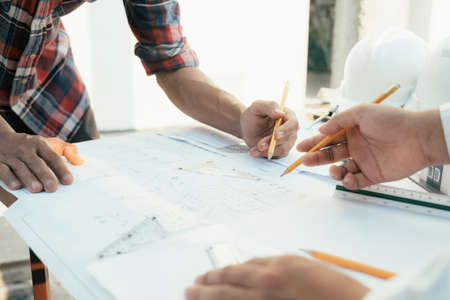 Engineer and architect working with new project.