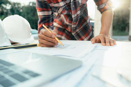 Engineer and architect working with new project.