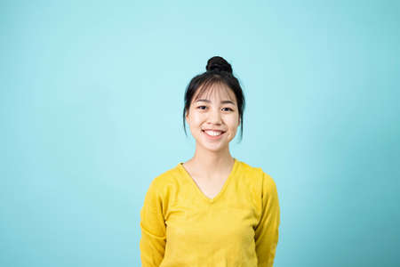 Young Asian woman smile confidently and proudの写真素材