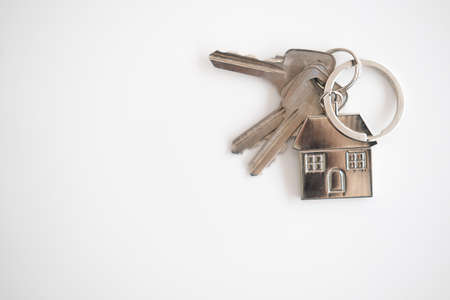 Businessman Holding House Keysの写真素材
