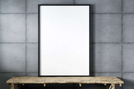 Blank empty picture frame mockup on gray cement wall..