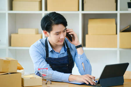 Young Asian businessman working talking.