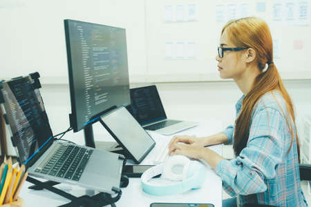 Programmer is coding and programming software.