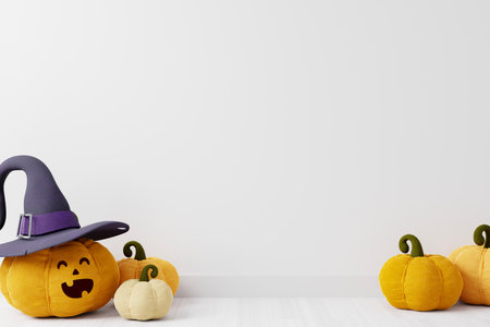 Halloween copyspace background with smiling pumpkins wearing hat on white background, smiling pumpkin face wearing hat, 3D rendering, Halloween theme with pumpkins on white background 3D illustration.の写真素材