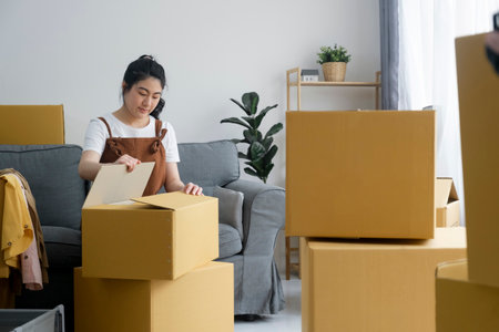 Modern female people in moving home apartment leisure indoor activity alone.