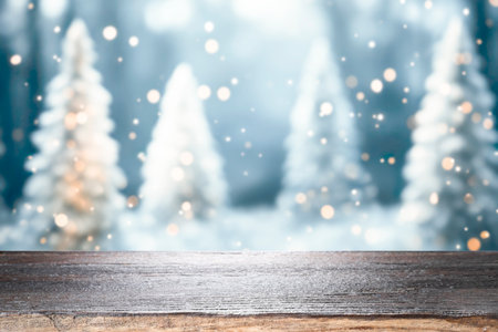 Empty wooden table for present product on christmas tree and bokeh blur background.の写真素材