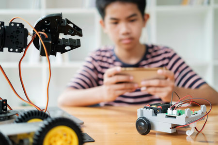 Student doing robot project in science technology of robotics programing and STEM education concept.の写真素材