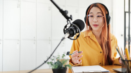 Live Podcast Session with Smiling Female Host.の写真素材