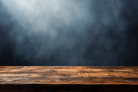 Rustic Wooden Table Surface with Misty Dark Blue Background.の写真素材