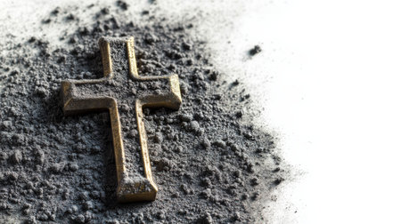 Cross is on top of a pile of dirtの写真素材