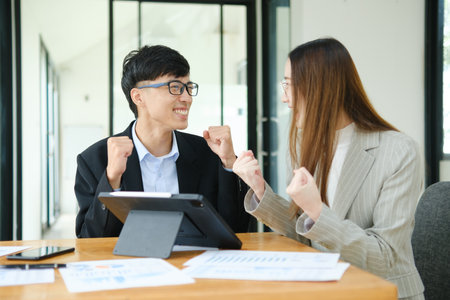Young business entrepreneurs celebrating a successの写真素材