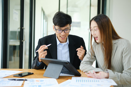 Young business entrepreneurs celebrating a successの写真素材