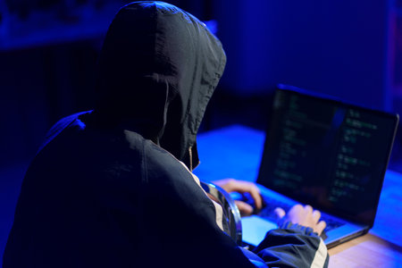 Hacker cyberattack representing data breach and cybersecurity threat in digital system