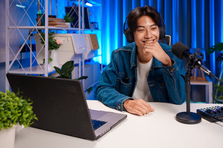 Podcast host enjoying online conversation