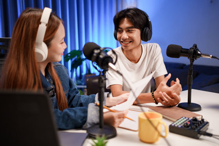 People in the podcast studio talking and recordingの写真素材