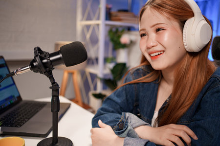 People in the podcast studio talking and recordingの写真素材