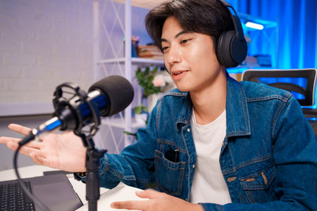 Man sharing opinion into podcast microphone
