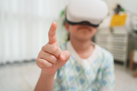 Child Student Pointing in Virtual Reality Learning and Funの写真素材
