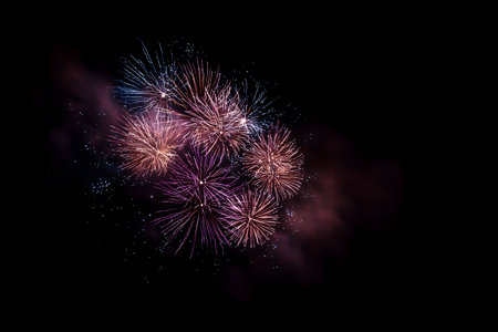 Fireworks display in the sky with a dark background