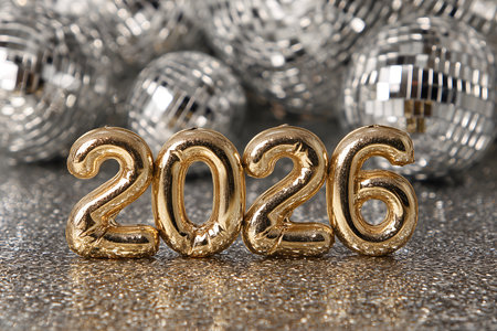 Gold foil sign with the numbers 2026 on it